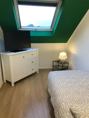 Ein Bett oder Betten in einem Zimmer der Unterkunft 4 Zimmer-Komfortwohnung mit viel Platz in Haltern