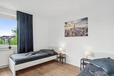 Ein Bett oder Betten in einem Zimmer der Unterkunft Worker Place Gelsenkirchen