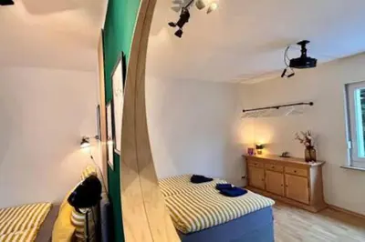 Ein Bett oder Betten in einem Zimmer der Unterkunft Modern & Stilvoll mit Kino - Wii