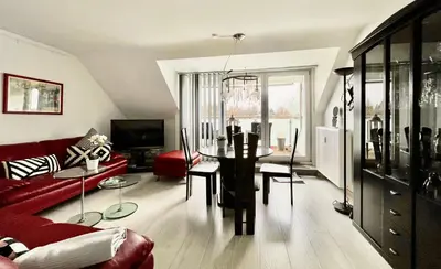 Ein Sitzbereich in der Unterkunft Apartment Orchidee