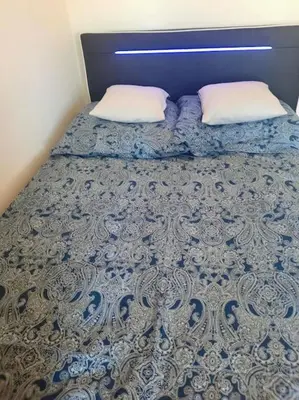 Ein Bett oder Betten in einem Zimmer der Unterkunft City-Wohnung mit Ausblick