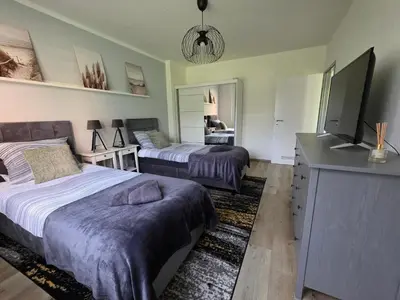 Ein Bett oder Betten in einem Zimmer der Unterkunft I&D Apartments