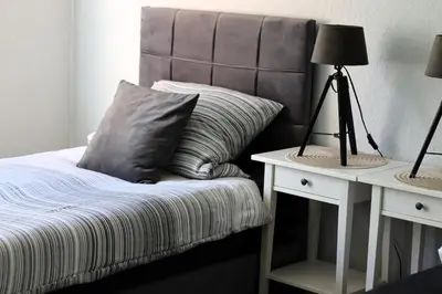 Ein Bett oder Betten in einem Zimmer der Unterkunft I&D Apartments