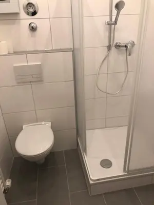 Ein Badezimmer in der Unterkunft HagenStay Delstern 1