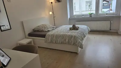 Ein Bett oder Betten in einem Zimmer der Unterkunft HagenStay Delstern 1