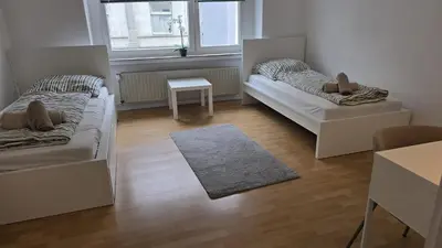 Ein Bett oder Betten in einem Zimmer der Unterkunft HagenStay Delstern 1
