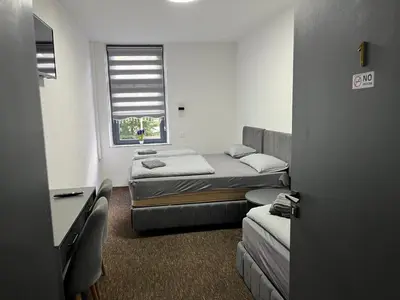 Ein Bett oder Betten in einem Zimmer der Unterkunft Duisburger Hostel
