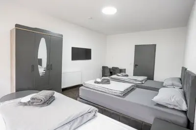 Ein Bett oder Betten in einem Zimmer der Unterkunft Duisburger Hostel