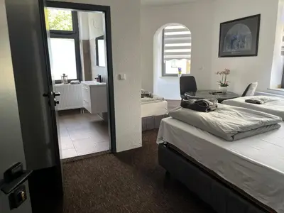 Ein Bett oder Betten in einem Zimmer der Unterkunft Duisburger Hostel