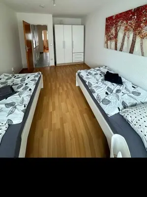 Ein Bett oder Betten in einem Zimmer der Unterkunft Ruhige FeWo am Wasserschloss