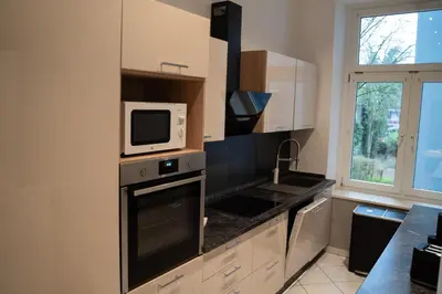 Küche/Küchenzeile in der Unterkunft Junik Apartments - Ferienwohnungen in Duisburg