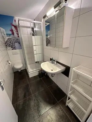 Ein Badezimmer in der Unterkunft Moderne Ferienwohnung für 4-5 Personen mitten in Herten*Netflix*Nespresso
