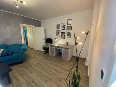Ein Sitzbereich in der Unterkunft Cozy Apartment