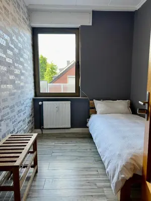 Ein Bett oder Betten in einem Zimmer der Unterkunft My Pension Duisburg