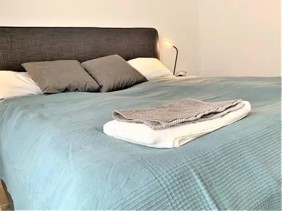 Ein Bett oder Betten in einem Zimmer der Unterkunft Stilvoll eingerichtete Wohnung in Essen-Südviertel