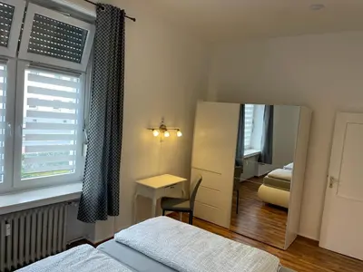 Ein Bett oder Betten in einem Zimmer der Unterkunft OnThePoint, Erdgeschoss, Abstellplatz für Fahrräder, City und Innenhafen 5 Gehminuten!!!