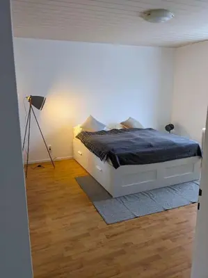 Ein Bett oder Betten in einem Zimmer der Unterkunft Zentral & sonnig