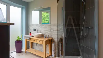 Ein Badezimmer in der Unterkunft Niederrheinhaus