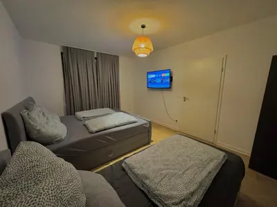 Ein Bett oder Betten in einem Zimmer der Unterkunft Stadtnest HII