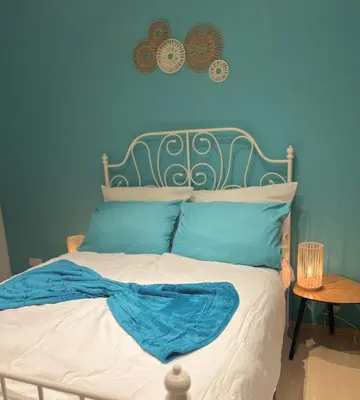 Ein Bett oder Betten in einem Zimmer der Unterkunft Cozy appartement in oberbarmen