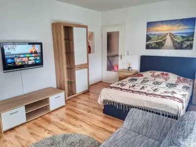 Ein Bett oder Betten in einem Zimmer der Unterkunft 2,5 Zimmer Apartment mit Balkon