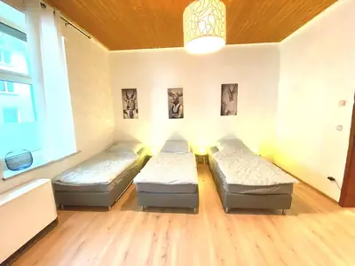Ein Bett oder Betten in einem Zimmer der Unterkunft Apartments in Essen