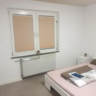 Ein Bett oder Betten in einem Zimmer der Unterkunft Privaterooms