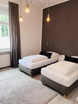 Ein Bett oder Betten in einem Zimmer der Unterkunft City nah wohnen in Wuppertal