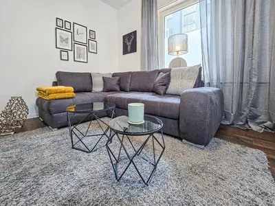 Ein Sitzbereich in der Unterkunft Alpha Apartments