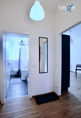 Ein Bett oder Betten in einem Zimmer der Unterkunft BEGE APARTMENTS Coporate Haven
