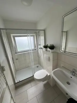 Ein Badezimmer in der Unterkunft Schöne Apartments am Rot-Weiss Essen Stadion E01 bis E04