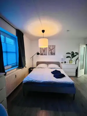 Ein Bett oder Betten in einem Zimmer der Unterkunft Citynahes modernes Apartment