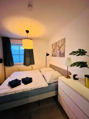 Ein Bett oder Betten in einem Zimmer der Unterkunft Citynahes modernes Apartment