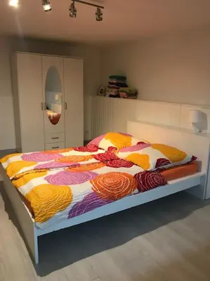 Ein Bett oder Betten in einem Zimmer der Unterkunft Schöne und große Ferien und Monteur Wohnung