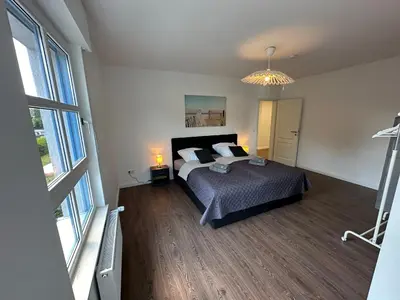 Ein Bett oder Betten in einem Zimmer der Unterkunft TRAUMHAFT schöne Wohnung-nahe Volkspark Marl-MODERN-TOP Austattung-