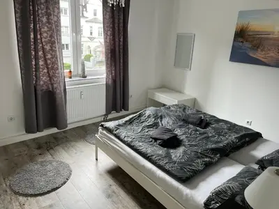 Ein Bett oder Betten in einem Zimmer der Unterkunft Geräumige, moderne 110 qm Wohnung Nähe Messe Essen