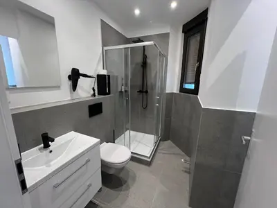 Ein Badezimmer in der Unterkunft Vibehome Düsseldorf - Little Tokyo
