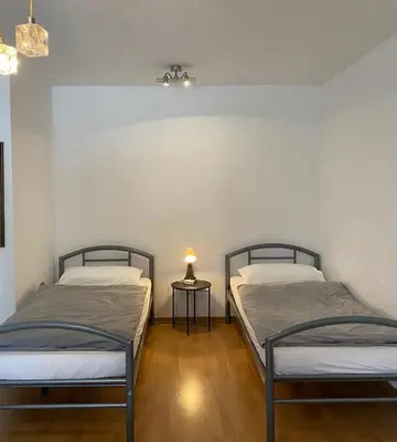 Ein Bett oder Betten in einem Zimmer der Unterkunft Düsseldorf 1995