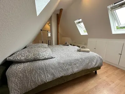 Ein Bett oder Betten in einem Zimmer der Unterkunft Zur schönen Aussicht I 80 m2 I Am Wald I Zuhause