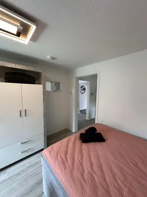 Ein Bett oder Betten in einem Zimmer der Unterkunft Zur schönen Aussicht I 80 m2 I Am Wald I Zuhause