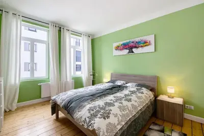 Ein Bett oder Betten in einem Zimmer der Unterkunft Ferienwohnung Nippesstr 17 in Ohligs