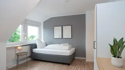 Ein Bett oder Betten in einem Zimmer der Unterkunft ERSTAY - moderne Zimmer