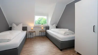 Ein Bett oder Betten in einem Zimmer der Unterkunft ERSTAY - moderne Zimmer