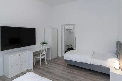 Ein Bett oder Betten in einem Zimmer der Unterkunft Modern, komfortabel, vollausgestattet - Apartments by mevoga