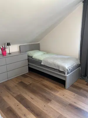 Ein Bett oder Betten in einem Zimmer der Unterkunft B&N Apartment inkl kostenlosen Stellplatz