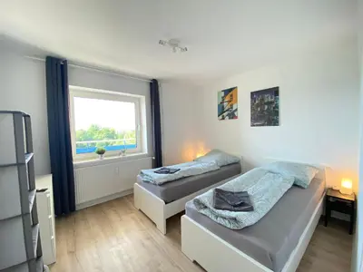 Ein Bett oder Betten in einem Zimmer der Unterkunft Cozy Apartment in Wuppertal