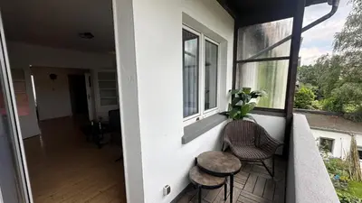 Ein Sitzbereich in der Unterkunft JUNIK Apartments Oberhausen No º11