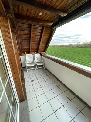 Ein Balkon oder eine Terrasse in der Unterkunft Großzügige Ferienwohnung für bis zu 4 Personen mit Balkon