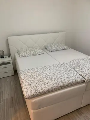 Ein Bett oder Betten in einem Zimmer der Unterkunft KM Apparts Wesel 4
