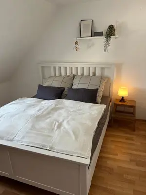 Ein Bett oder Betten in einem Zimmer der Unterkunft Gemütliches privates Apartment